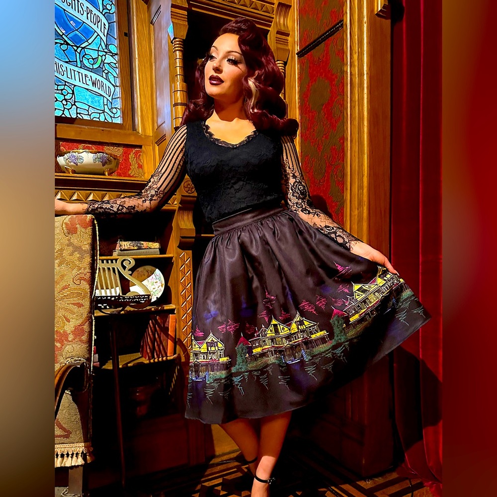 Vintage-Inspired Black Print Circle Skirt with Colorful Village Border
